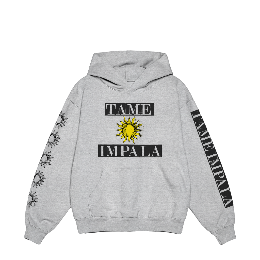 Grey hoodie with “Tame Impala” text and a yellow sun graphic between the words on the front. The right sleeve is decorated with black-and-white sun graphics, and the left sleeve features white “Tame Impala” text on a black panel.